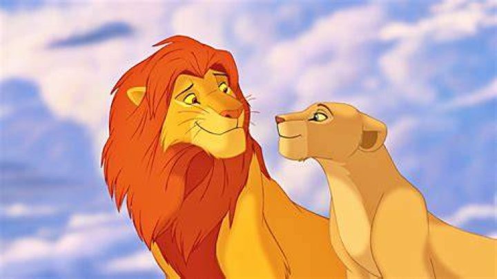 Simba and Nala cuddle in The Lion King